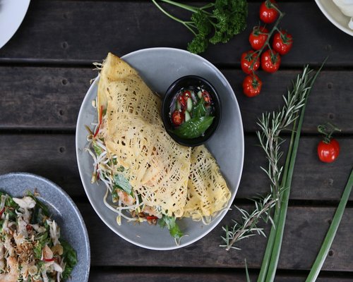 Healthy everyday Thai meal on a wooden table